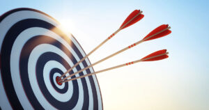 A target with arrows representing target marketing and segmentation